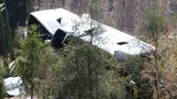 1 killed after charter bus carrying 46 plunges down Alabama ravine