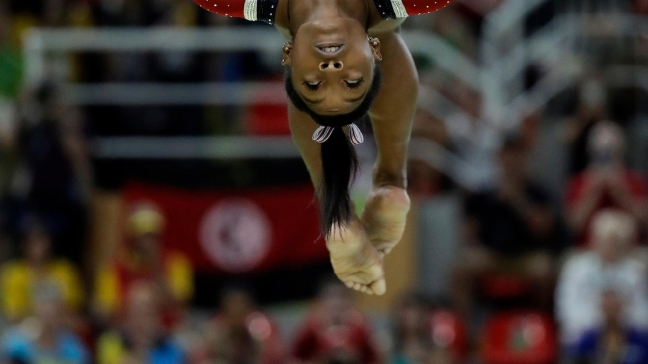 Biles' run at Olympic history ends with bronze on the beam